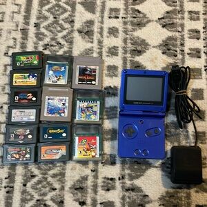 Gameboy Advance SP w/ charger and all of the games shown